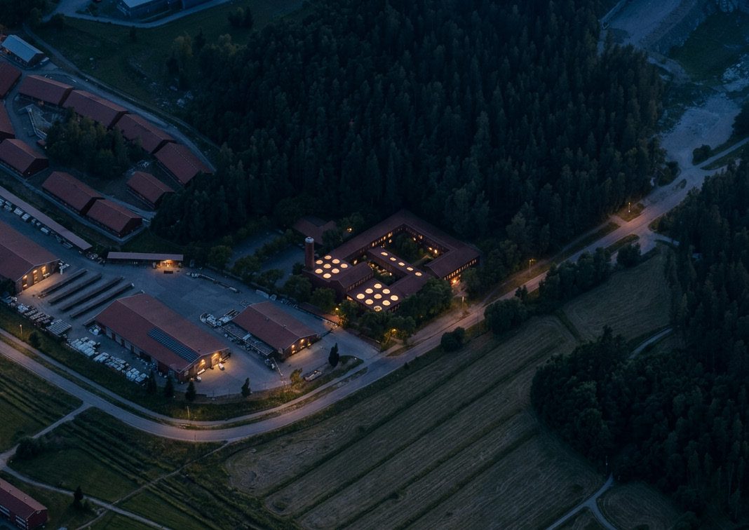 Aerial view of the Islamic Center at dusk, courtyard lit from above